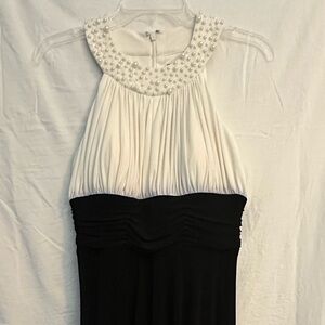 Beautiful black and ivory dress with pearl neckline, J Howard